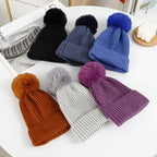 Bonnet à Gros Pompon Moelleux en Maille pour le Ski