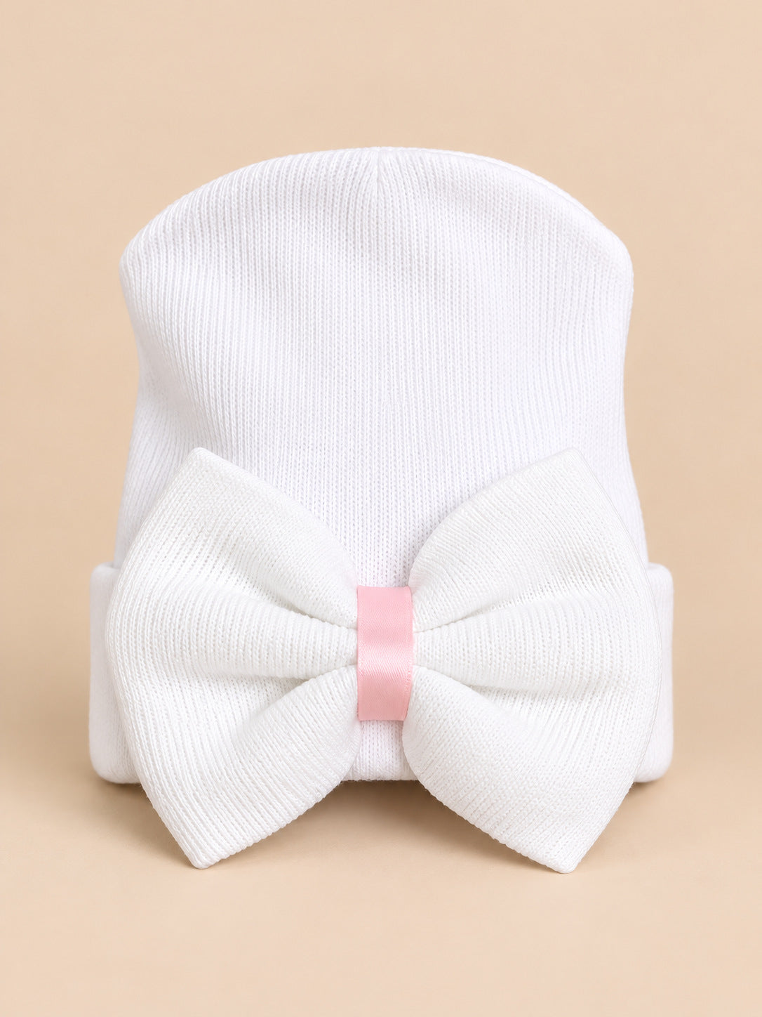 Bonnet bébé naissance uni blanc en coton, gros nœud blanc à bande rose, vue de face