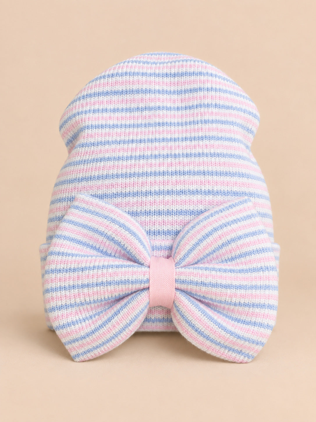 Bonnet bébé naissance en coton rose et bleu, rayures et gros nœud, vue de face
