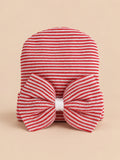 Bonnet bébé naissance en coton rouge et blanc, rayures et gros nœud, vue de face
