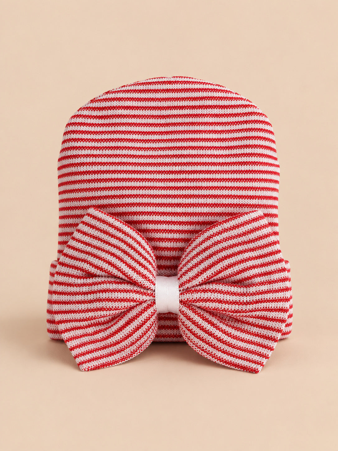 Bonnet bébé naissance en coton rouge et blanc, rayures et gros nœud, vue de face