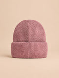 Bonnet femme en fourrure de lapin et coton épais, modèle 1, vue de face sur fond pêche sable