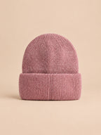 Bonnet femme en fourrure de lapin et coton épais, modèle 1, vue de face sur fond pêche sable