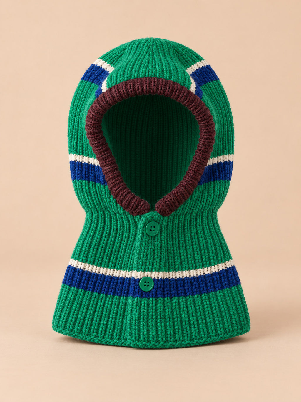 Cagoule bébé en laine rayée modèle D, vue de face, fond pêche sable