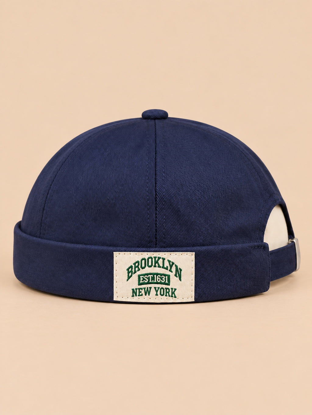 Bonnet docker BROOKLYN1631 bleu marine, vue de face, étiquette vintage.