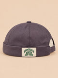 Bonnet docker BROOKLYN1631 gris, vue de face, étiquette vintage.
