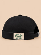 Bonnet docker BROOKLYN1631 noir, vue de face, étiquette vintage.