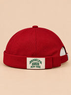 Bonnet docker BROOKLYN1631 rouge, vue de face, étiquette vintage.
