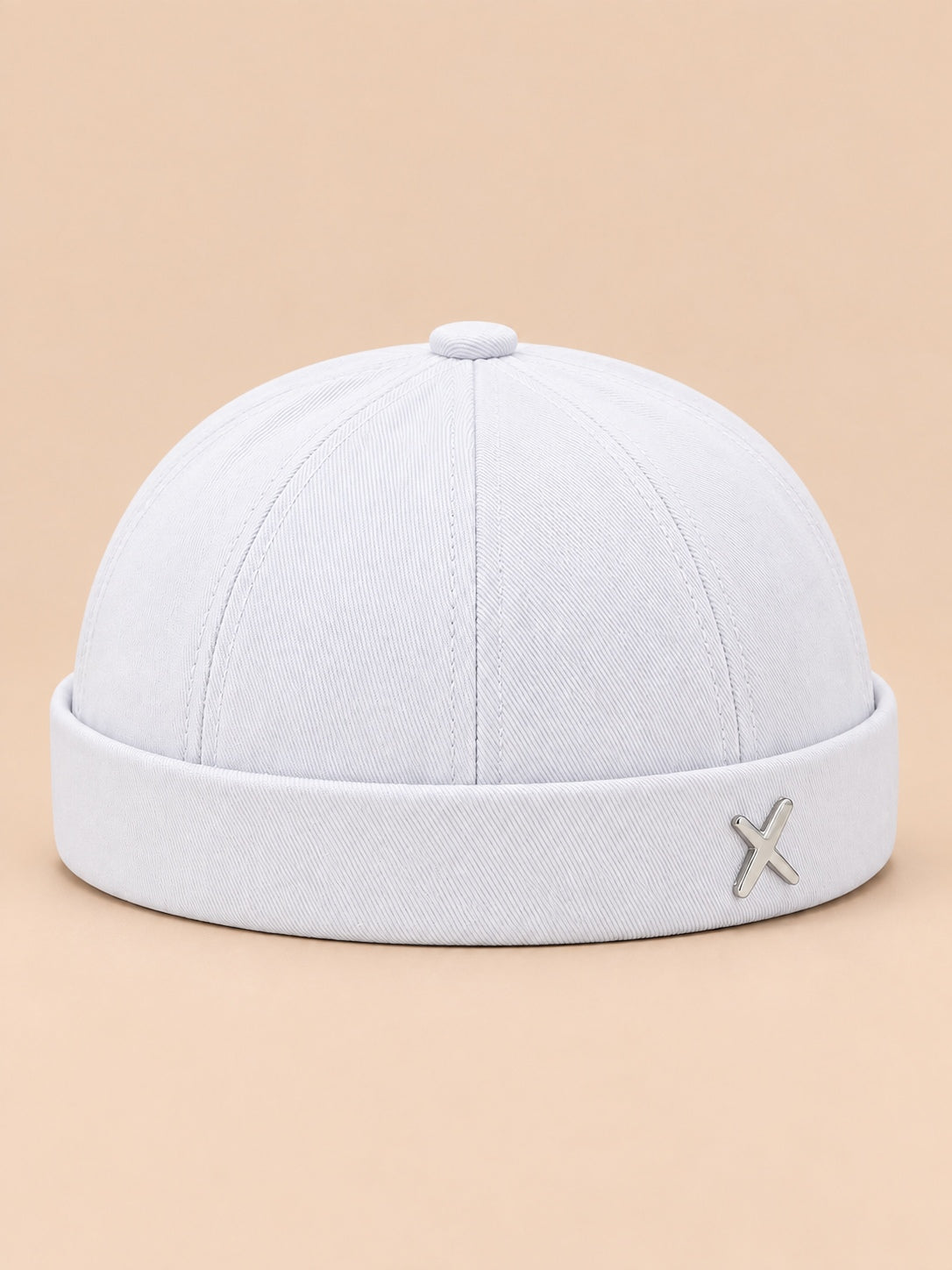 Bonnet docker vintage délavé blanc, vue de face.