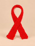 Écharpe enfant en grosse maille rouge, vue de face.
