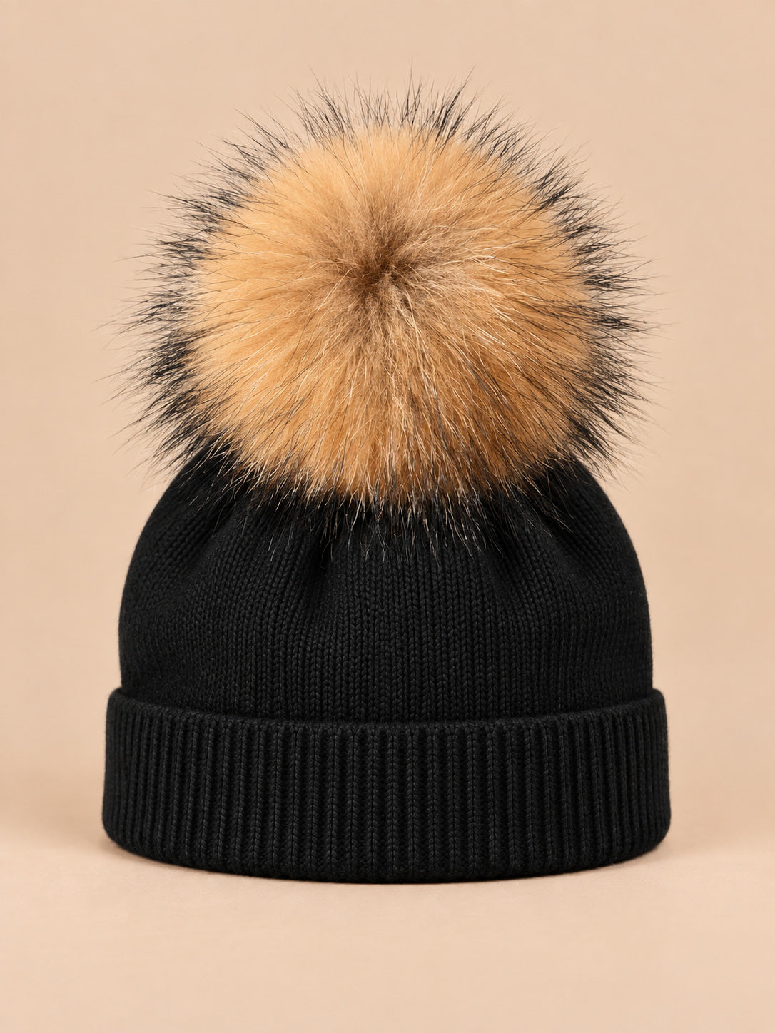 Bonnet enfant noir pompon naturel en maille à revers, vue de face