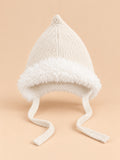 Bonnet enfant lutin à oreillettes beige, vue de face.