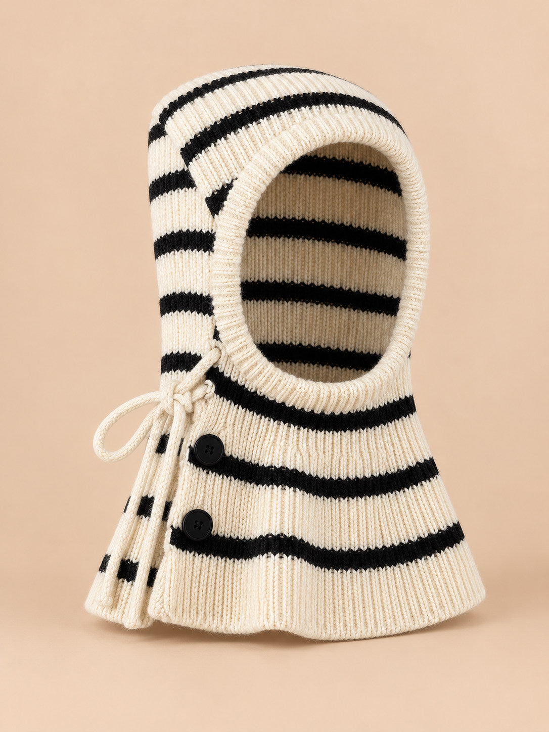 Cagoule enfant rayée modèle A5, vue de face, fond pêche sable