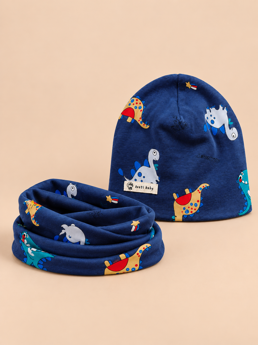 Ensemble bonnet et snood enfant Dinosaure bleu marine, vue de face.