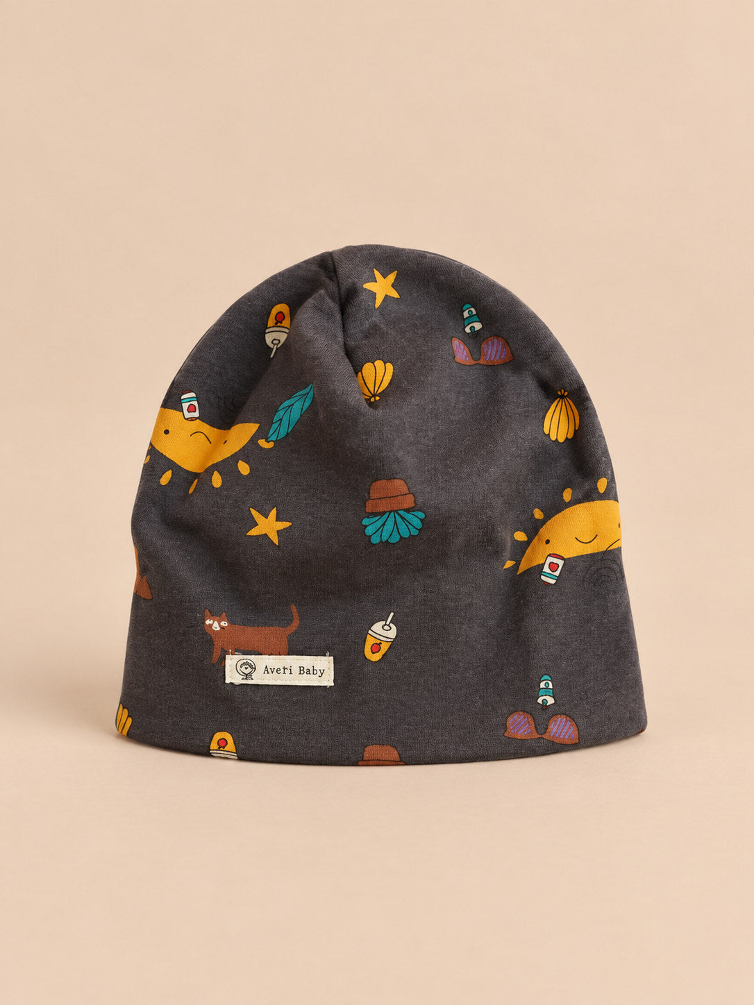 Bonnet enfant Pastèque, vue de face, fond pêche sable
