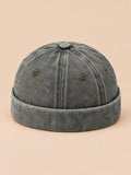 Bonnet marin docker en denim délavé vert, vue de face.