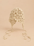 Bonnet pêcheur ajouré au crochet, beige, vue de face