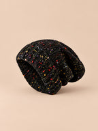 Bonnet slouchy femme bicolore en maille mouchetée, noir, vue de trois quarts
