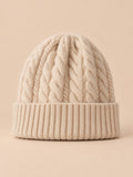 Bonnet torsadé femme en pure laine, beige, vue de face