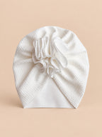 Bonnet turban bébé fille à fleur en tissu, blanc, vue de face
