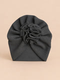 Bonnet turban bébé fille à fleur en tissu, noir, vue de face