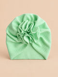 Bonnet turban bébé fille à fleur en tissu, vert, vue de face
