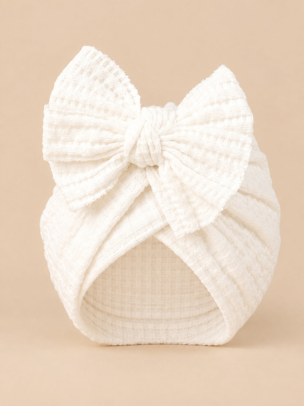 Bonnet turban bébé fille en coton tricoté blanc, nœud, vue de face